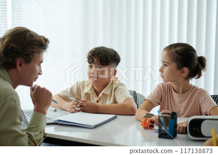 Discussing Project With Children in Classroom Setting 117138873