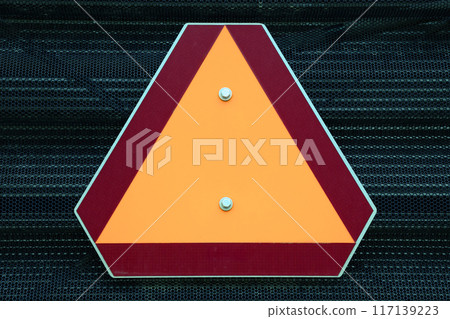 caution triangle orange sing on black grid background 117139223
