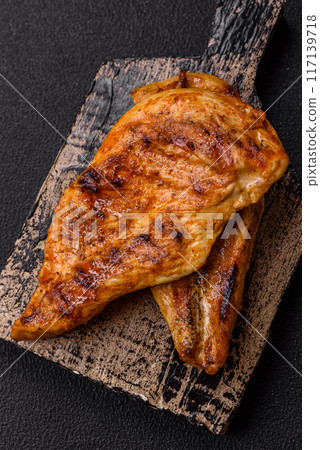 Delicious fresh grilled chicken fillet with spices and herbs 117139718