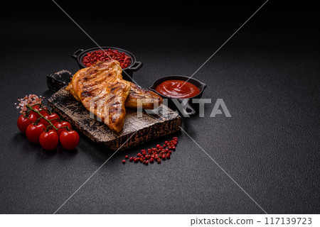 Delicious fresh grilled chicken fillet with spices and herbs 117139723