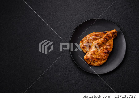 Delicious fresh grilled chicken fillet with spices and herbs 117139728