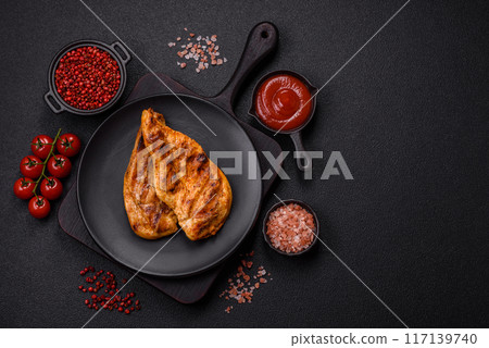 Delicious fresh grilled chicken fillet with spices and herbs Delicious fresh grilled chicken fillet with spices and herbs 117139740