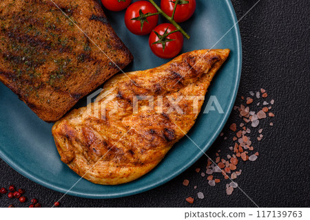 Delicious fresh grilled chicken fillet with spices and herbs 117139763