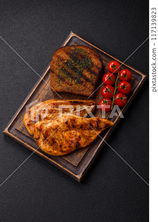 Delicious fresh grilled chicken fillet with spices and herbs 117139823