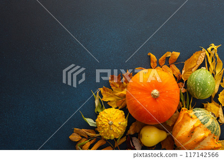 Pumpkins and fallen leaves Pumpkins and fallen leaves 117142566