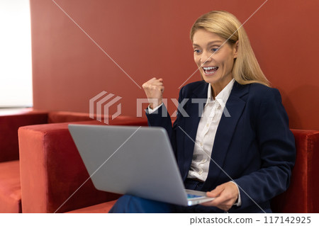 Successful businesswoman entrepreneur in office using laptop at work Successful businesswoman entrepreneur in office using laptop at work 117142925