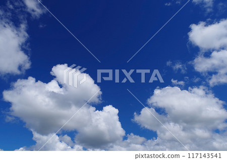 White clouds floating in the summer sky White clouds floating in the summer sky 117143541