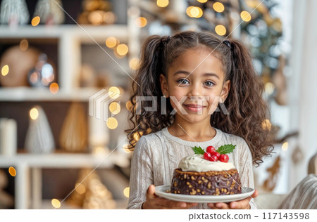 Christmas cake. Girl with pudding. Plum chocolate dessert with rum. Xmas british dinner. English figgy fruitcake with sauce and brandy. Kid with black sweet cake. Family winter pudding with Xmas decor 117143598