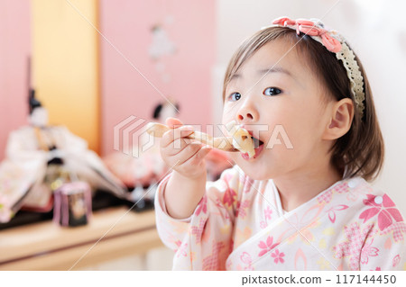 Girls celebrating Hinamatsuri (Girls' Day) Girls celebrating Hinamatsuri (Girls' Day) 117144450