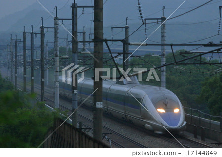 A 500 series Kodama train heading west (to Hakata) in the drizzle A 500 series Kodama train heading west (to Hakata) in the drizzle 117144849