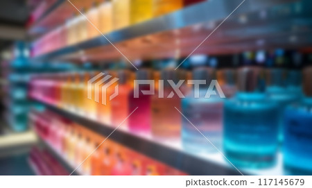Colorful Perfume Bottles Displayed on Shelves  117145679