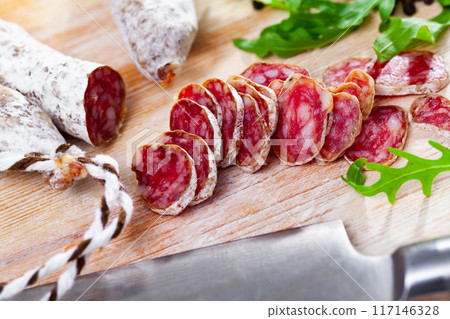 Sliced spanish sausage fuet 117146328