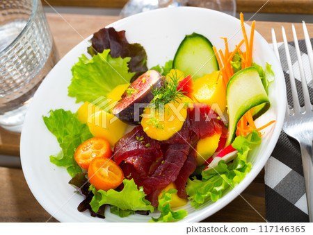 Tuna salad with vegetables and fruits Tuna salad with vegetables and fruits 117146365