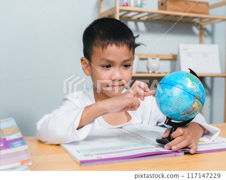 Asian boy looking and point your finger at globe find the location of countries in the world, Concept for research global warming, global network, SEO search engine, Save the Earth, Ecology, Kid Asian boy looking and point your finger at globe find the location of countries in the world, Concept for research global warming, global network, SEO search engine, Save the Earth, Ecology, Kid 117147229