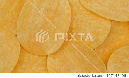 Crispy Potato Chips as background - Perfect for Snack Food and Culinary Stock Photography Crispy Potato Chips as background - Perfect for Snack Food and Culinary Stock Photography 117147406