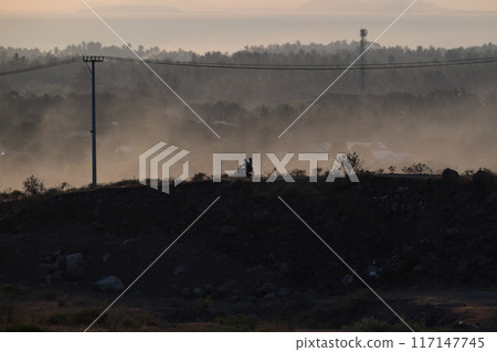 Misty morning atmosphere in Pekosong village, Lombok, Indonesia 117147745