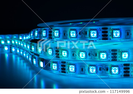 Blue chasing LED tape placed on table Blue chasing LED tape placed on table 117149996