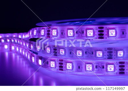Pink chasing LED tape placed on table Pink chasing LED tape placed on table 117149997
