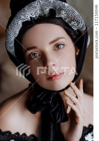 Portrait elegant baroque lady in lavishlace gown. 117150046