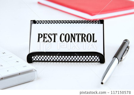 Conceptual caption Pest Control. Word PEST CONTROL Written on a business card on a white background 117150578