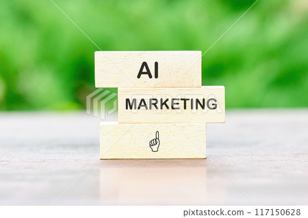 Business AI artificial intelligence marketing concept. Copy space. AI marketing symbol. Concept words AI MARKETING on wooden bars against a background of green plants without focus Business AI artificial intelligence marketing concept. Copy space. AI marketing symbol. Concept words AI MARKETING on wooden bars against a background of green plants without focus 117150628