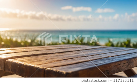 wood table top on blurred beach background 117153111
