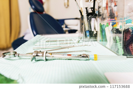 Set of dental tools on dentist's panel. Stomatologist tools close-up on table. Close up of dental tools on dentist's table, Dentist tools on the table Set of dental tools on dentist's panel. Stomatologist tools close-up on table. Close up of dental tools on dentist's table, Dentist tools on the table 117153688