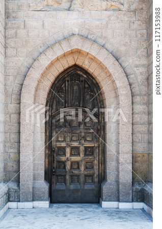 ancient iron door to Cathedral of the Sacred Heart of Jesus in Tashkent in Uzbekistan ancient iron door to Cathedral of the Sacred Heart of Jesus in Tashkent in Uzbekistan 117153988