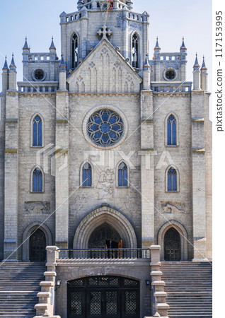exterior of Cathedral of Sacred Heart of Jesus. Ancient Roman Catholic Church in Tashkent in Uzbekistan 117153995