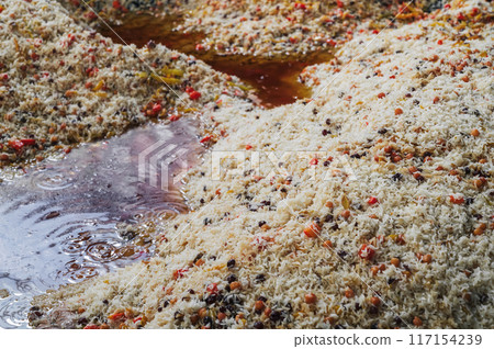 traditional asian dish of Uzbek cuisine is rice pilaf in cauldron in kitchen of restaurant in Tashkent Pilaf Center Besh Qozon in Uzbekistan close-up 117154239