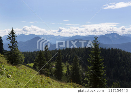 Mountain hiking Jochberg, Bavaria, Germany in summertime Mountain hiking Jochberg, Bavaria, Germany in summertime 117154443