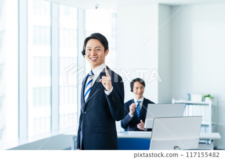 Japanese male operator working in an office 117155482