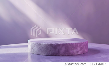 A Single Circular Concrete Podium Under Purple Lighting 117156016