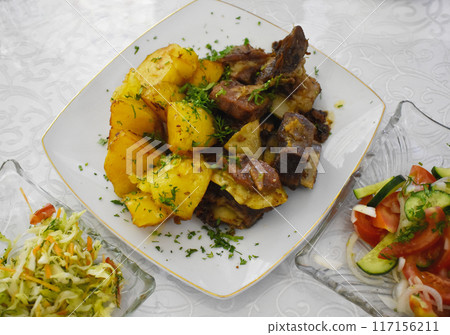 Uzbek lamb and potato dish Uzbek lamb and potato dish 117156211