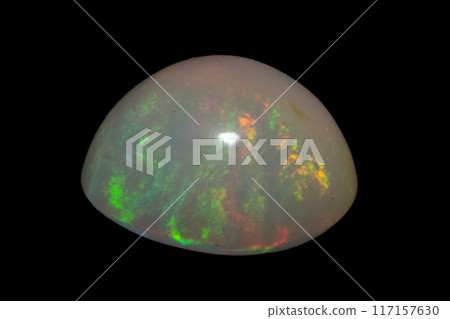 natural rainbow opal gem isolated on black background natural rainbow opal gem isolated on black background 117157630