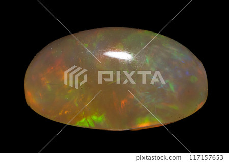 natural rainbow opal gem isolated on black background natural rainbow opal gem isolated on black background 117157653