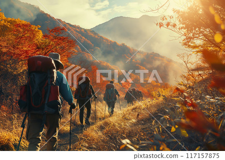 People walking through the autumn leaves 117157875
