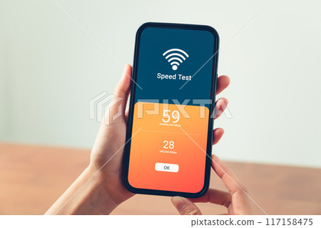 Hand using smartphone with showing WIFI speed test and loading bar for download software on internet or data form website. Hand using smartphone with showing WIFI speed test and loading bar for download software on internet or data form website. 117158475