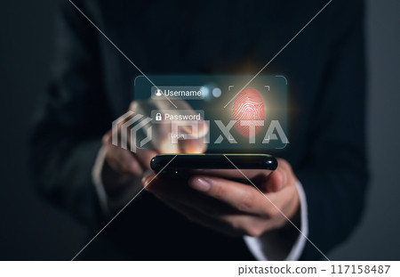 Businessman hand using smartphone and press scan fingerprints your username and password to access the system, login screen, private data and prevent identity. Businessman hand using smartphone and press scan fingerprints your username and password to access the system, login screen, private data and prevent identity. 117158487
