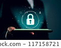 Businessman holding smartphone and showing padlock, protecting data on internet technology networking GDPR(general data protection regulation). 117158721