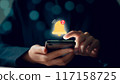 Businessman hand using smartphone with showing the bell icon and notifications of new messages on application. 117158725