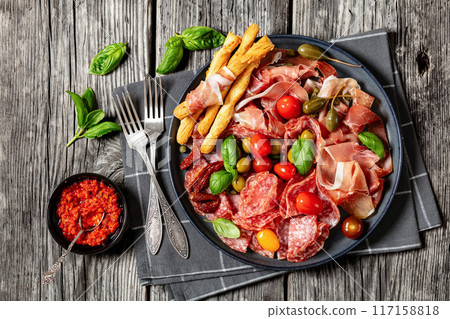 italian antipasto plate of cured meat and veggies italian antipasto plate of cured meat and veggies 117158818