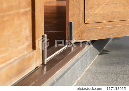 Bottom running bifold system is installed on the floor. Bottom running bifold system is installed on the floor. 117158935