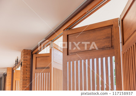 Top hung bifold system for large door panels. 117158937
