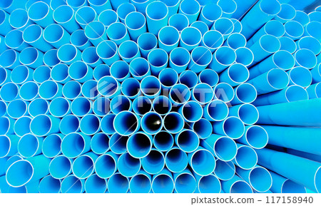 PVC pipes for Construction stacked on Shelf In Warehouse 117158940