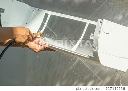 air conditioning cleaning service with water spray 117159236