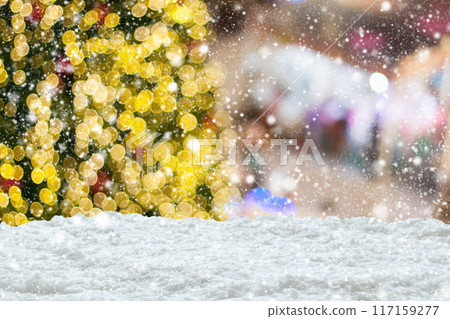 Empty white snow with blur Christmas tree with bokeh light background Empty white snow with blur Christmas tree with bokeh light background 117159277