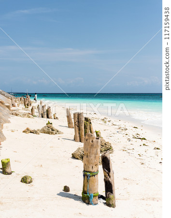beautiful view of blue ocean and sky from sandy beach beautiful view of blue ocean and sky from sandy beach 117159438