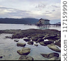 Photo of a beach with beautiful rocks surrounded by islands in the Natuna area. 117159990