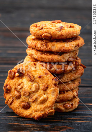 Mix of cookies chocolate and peanut . Many unhealthy snacks . 117160388